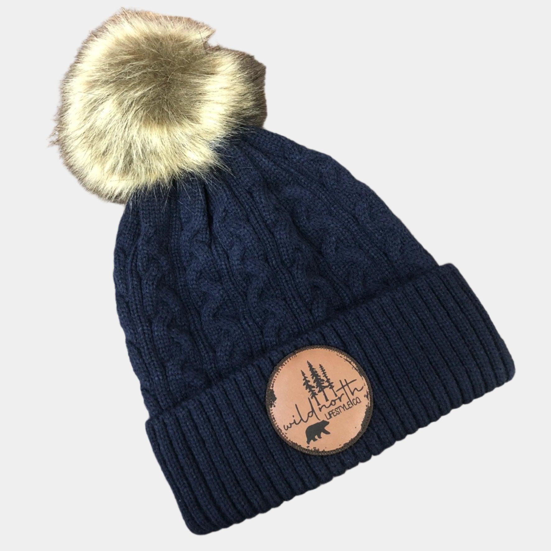 Wild North Jacquard Knit Faux Fur Toque with Patch